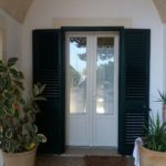 persiana verde Raffaello con infisso bianco perla in pvc